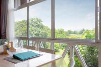 Balkón nebo terasa v ubytování Golf View Suite Private Apartment Khao Yai