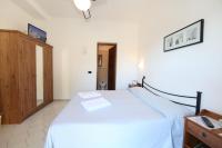 Postel nebo postele na pokoji v ubytování Hotel Villa Wanda