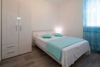 Posteľ alebo postele v izbe v ubytovaní Apartment Fragola