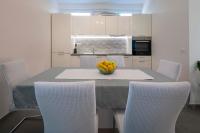Kuchyňa alebo kuchynka v ubytovaní Apartment Fragola