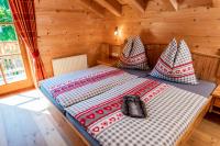 Posteľ alebo postele v izbe v ubytovaní Berg Chalet