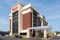 un edificio con un cartel de farmacia encima en Drury Inn &amp; Suites Terre Haute, en Terre Haute