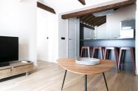 Televízia a/alebo spoločenská miestnosť v ubytovaní Aqua Apartments Málaga