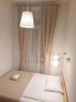 Posteľ alebo postele v izbe v ubytovaní Apartamenty Winnicy Kresy II