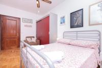 Posteľ alebo postele v izbe v ubytovaní Antique beautiful apartment in center with terrace & sea view
