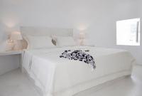 Posteľ alebo postele v izbe v ubytovaní Windmill Maisonette Asv Oia Santorini