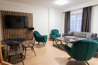 A television and/or entertainment centre at INN HOUSE LOFT SPA