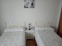 Posteľ alebo postele v izbe v ubytovaní Apartamento LA FRAGUA