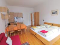 Posteľ alebo postele v izbe v ubytovaní Apartments Hellwagstraße