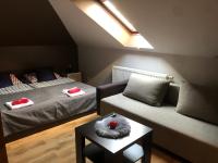 Posteľ alebo postele v izbe v ubytovaní Apartamenty Maria