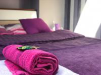 Posteľ alebo postele v izbe v ubytovaní Apartamenty Maria