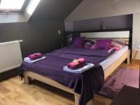 Posteľ alebo postele v izbe v ubytovaní Apartamenty Maria