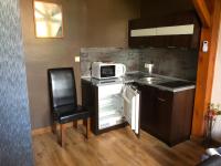 Kuchyňa alebo kuchynka v ubytovaní Apartamenty Maria