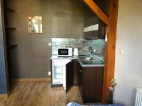 Kuchyňa alebo kuchynka v ubytovaní Apartamenty Maria
