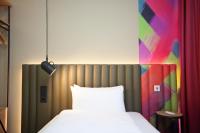 Posteľ alebo postele v izbe v ubytovaní ibis Styles Parndorf Neusiedler See