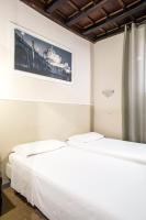A bed or beds in a room at Dell'Orso Residence