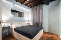 A bed or beds in a room at Dell'Orso Residence