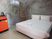 Postel nebo postele na pokoji v ubytování Banrimkhao pakchong