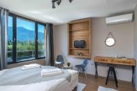 Cornelia Deluxe Residenceにあるベッド