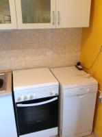 Kuchyňa alebo kuchynka v ubytovaní King Apartman