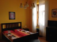 Posteľ alebo postele v izbe v ubytovaní King Apartman