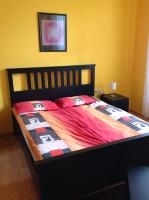 Posteľ alebo postele v izbe v ubytovaní King Apartman
