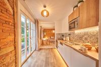 Kuchyň nebo kuchyňský kout v ubytování Apartmány CHALLUPA