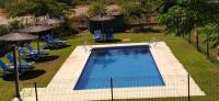 Bazén v ubytování Apartamentos Rurales La Fatela nebo v jeho okolí