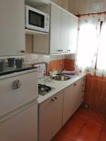 Kuchyň nebo kuchyňský kout v ubytování Apartamentos Flor del Cotillo