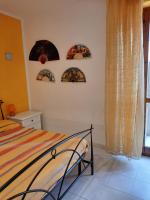 Postel nebo postele na pokoji v ubytování La casa di Carmen