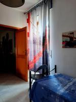 Postel nebo postele na pokoji v ubytování La casa di Carmen