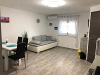 Posedenie v ubytovaní Tőzike apartman