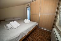 Posteľ alebo postele v izbe v ubytovaní Apartments Karina by El-Pi Tours
