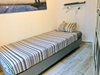 Posteľ alebo postele v izbe v ubytovaní Urban Manesa city center apartment with private patio