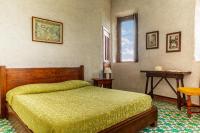 A bed or beds in a room at Torre Rivolta