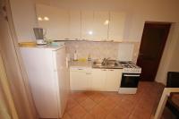 Kuchyň nebo kuchyňský kout v ubytování Cosy apartment 5min to beach Mirela Borik