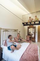 Posteľ alebo postele v izbe v ubytovaní Leano Agriresort