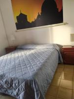 Posteľ alebo postele v izbe v ubytovaní Domus Getsemani