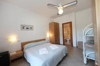 Postel nebo postele na pokoji v ubytování Hotel Villa Wanda