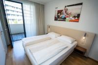 Posteľ alebo postele v izbe v ubytovaní Appartementhaus Karawankenhof