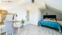 Posteľ alebo postele v izbe v ubytovaní Wonder Home - Apartamenty w cichej i zielonej części Karpacza - z miejscem na grilla i parkingiem