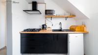 Kuchyňa alebo kuchynka v ubytovaní Wonder Home - Apartamenty w cichej i zielonej części Karpacza - z miejscem na grilla i parkingiem