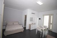 Łóżko lub łóżka w pokoju w obiekcie Puglia casa vacanza