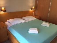 Posteľ alebo postele v izbe v ubytovaní Villiana Holiday Apartments