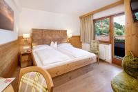 Posteľ alebo postele v izbe v ubytovaní Hotel Platzl