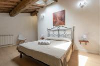 Łóżko lub łóżka w pokoju w obiekcie Luxury Home Florence vista Cappelle Medicee