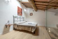 Łóżko lub łóżka w pokoju w obiekcie Luxury Home Florence vista Cappelle Medicee
