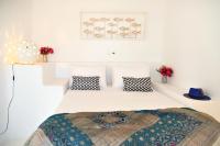 Posteľ alebo postele v izbe v ubytovaní Mando Pool Villas w Sea Views - Five Bedrooms