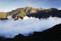 a view of the mountains with clouds in the valley at Alishan Shermuh Tourist Hotel in Zhongzheng