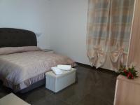 A bed or beds in a room at La valle del re